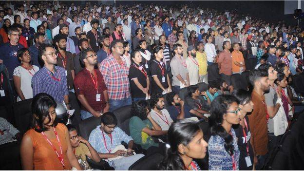 Twelve arrested for sitting during national anthem at Indian cinema