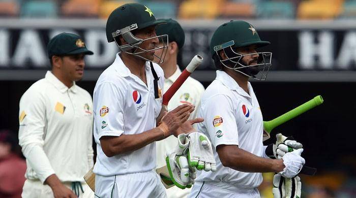 Day-night Test day 4: rain threatens play as Pakistan resist Australia