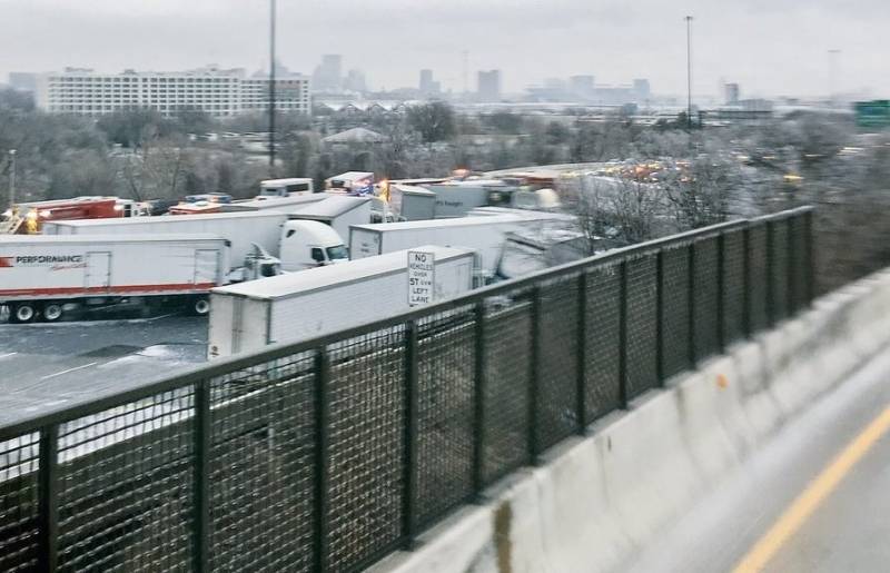 Two dead as dozens of vehicles crash on icy Baltimore road