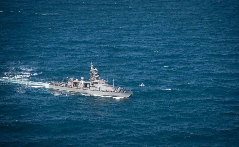 US Navy destroyer fires warning shots at Iranian vessels: officials