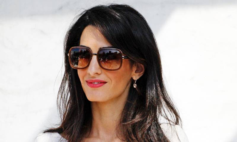 Amal expecting twins