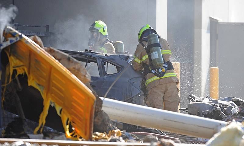 Five killed as plane crashes into roof of shopping mall