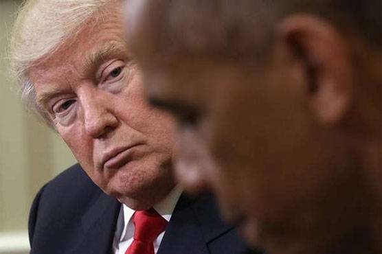 Trump blames Obama for security leaks, demonstrations