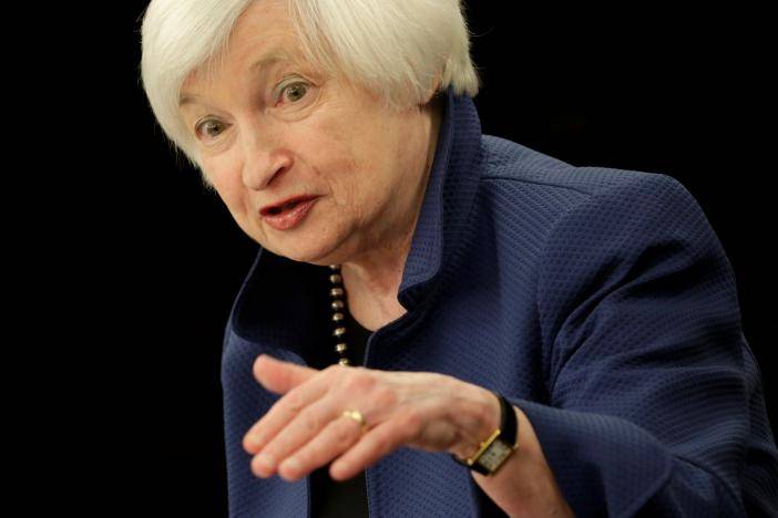 Fed raises rates for 2nd time in three years as job gains