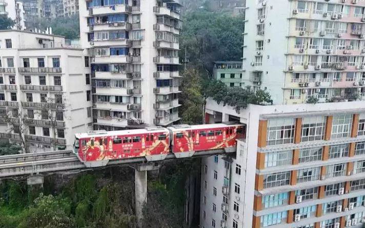 Watch: Chinese train goes through building