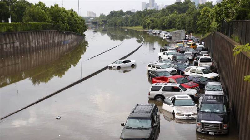 Four dead, about 200,000 without power after storms