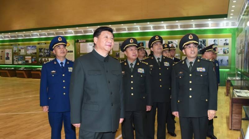 China’s Xi announces consolidation of military units