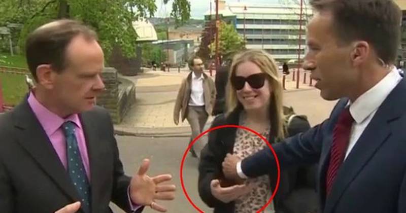 Video: Woman slaps reporter after appearing to touch her breast on air