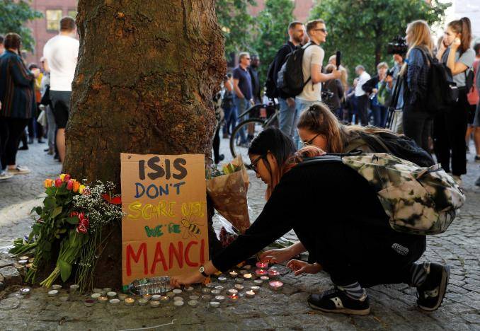 Manchester police name suicide bomber, threat level raised to critical 