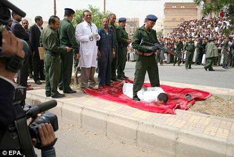 Child rapist-killer publicly executed with machine gun