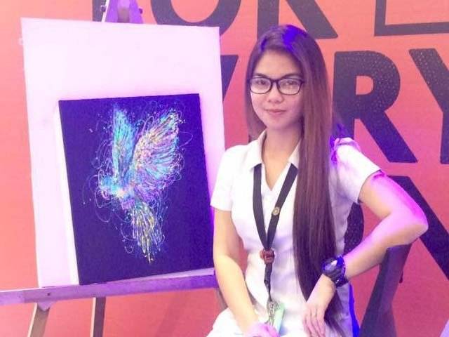 Filipino nurse paints using syringe