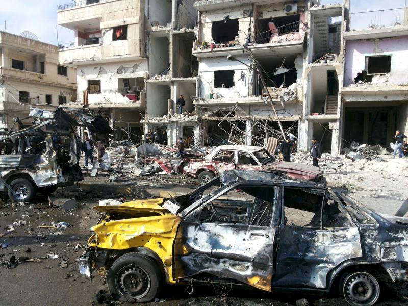 74 killed, dozens injured in twin car bomb and gun attack claimed by IS in Iraq