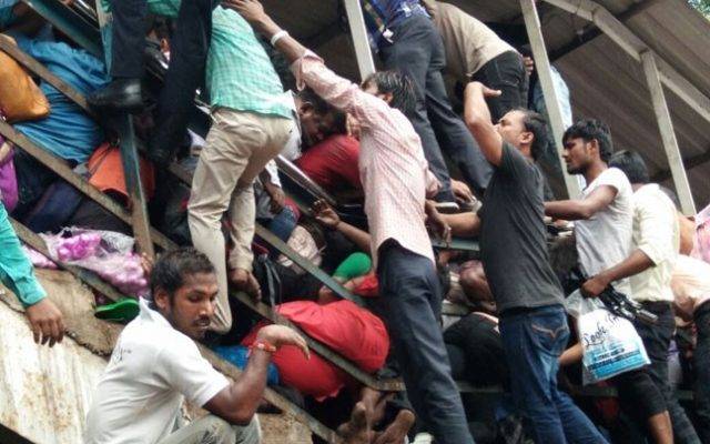 At least 22 dead, dozens injured in Mumbai railway bridge stampede