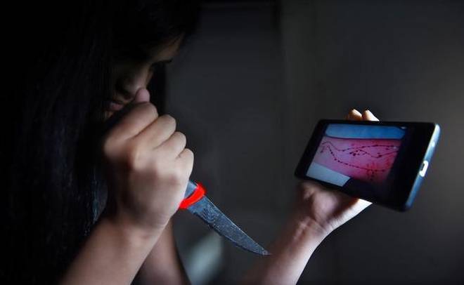 Two girls expelled from college after found playing ‘Blue Whale’ game