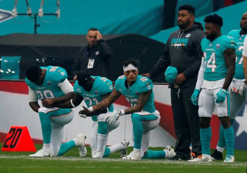3 Miami Dolphins dare to defy Trump order to stand during anthem  