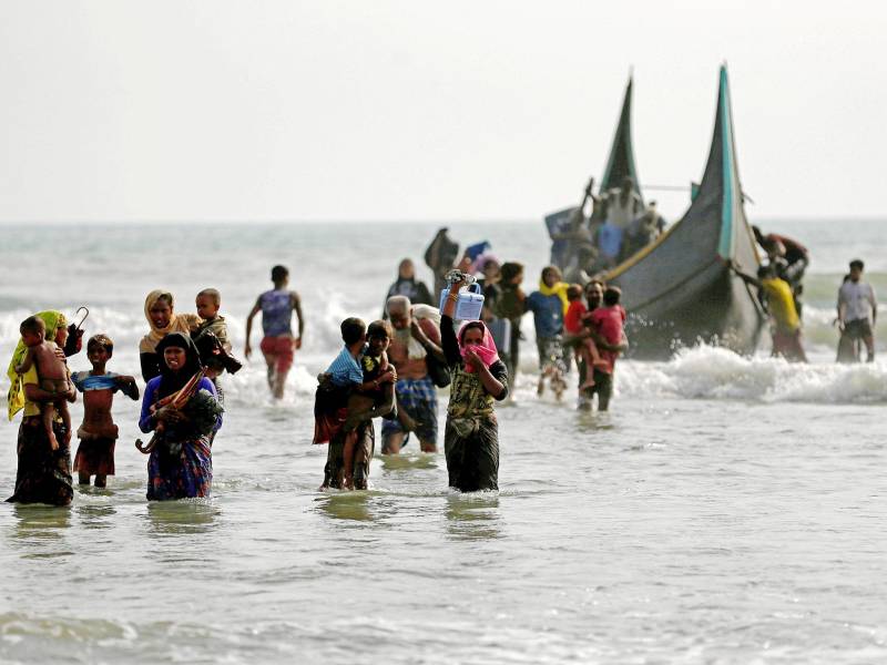 Dozen mostly children dead, scores missing as Rohingya boat capsizes