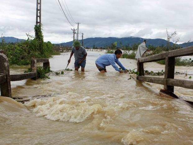 Floods and landslides in Vietnam kill 43, leave 34 missing