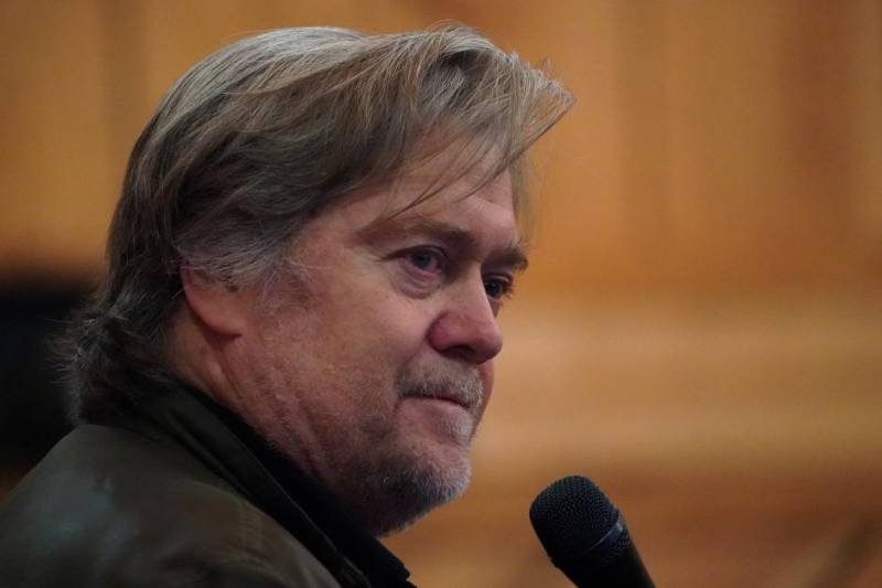 Under fire, Bannon backs off explosive comments about Trump's son