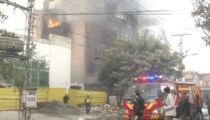 Rescue teams douse fire on MM Alam Road