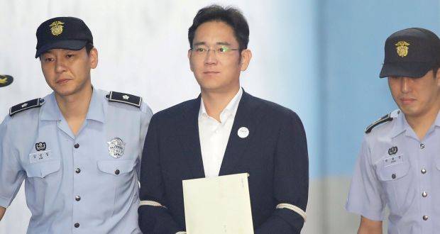 Samsung scion Lee walks free as South Korea court suspends jail term
