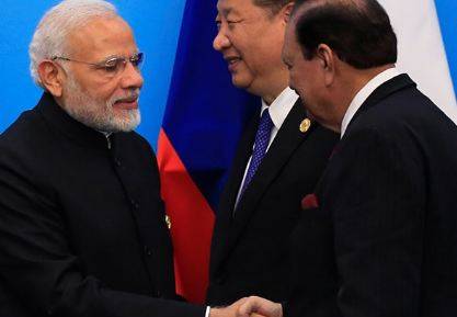 President Mamnoon Hussain, PM Modi shake hands at SCO meeting 