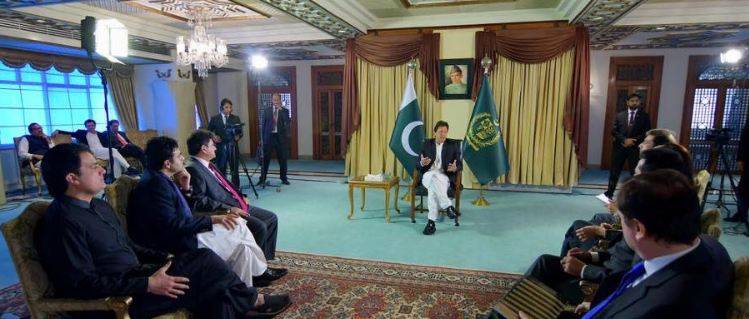 Decision to devalue rupee against dollar was taken by SBP: PM Imran