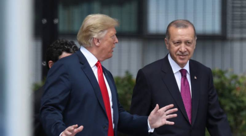 US slaps sanctions on Turkey, demands Syria ceasefire