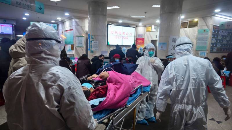 Coronavirus death passes 1,000 as Xi visits frontline hospital