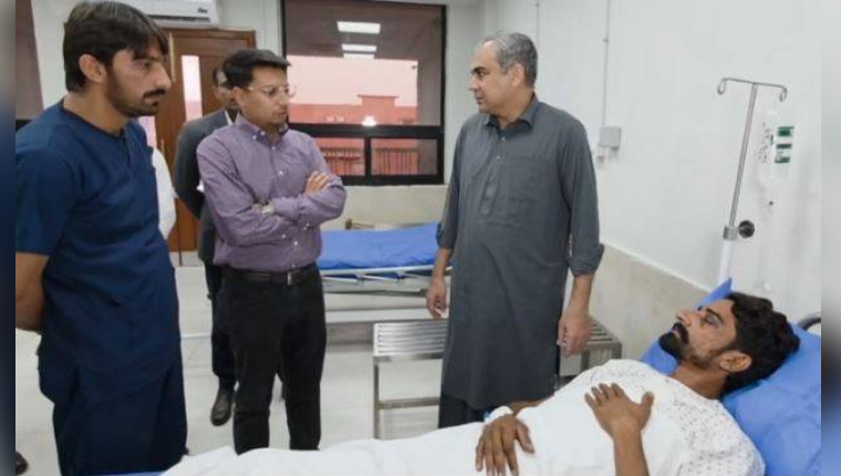 Interior minister Mohsin Naqvi visits drone attack victim in Rawalpindi hospital