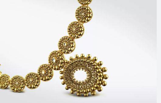 Gold price decreases by Rs900 per tola in Pakistan