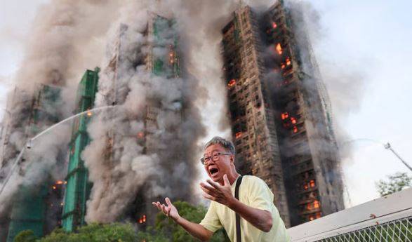 Deadly blaze in Hong Kong high-rise: 13 killed, including firefighter
