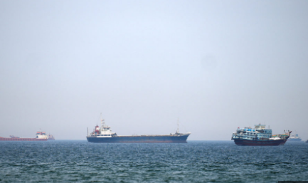 Iran warns US Navy against entering Strait of Hormuz after Trump says military will 'guide' stranded ships 